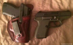Two of the author's PF-11s. Both have the carry clip installed, and one is in an Alessi Talon IWB holster.