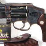 Handgun review photo: Left-side thumbnail of S&W Model 40-1.