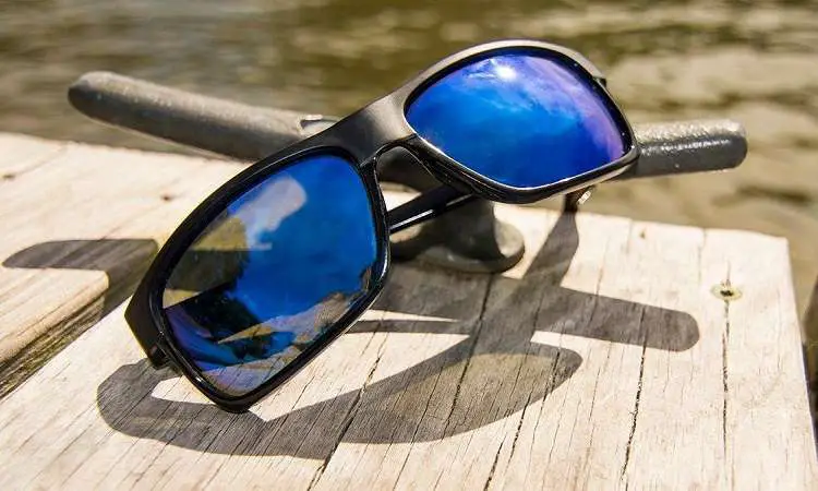 Sunglasses On Wooden Table