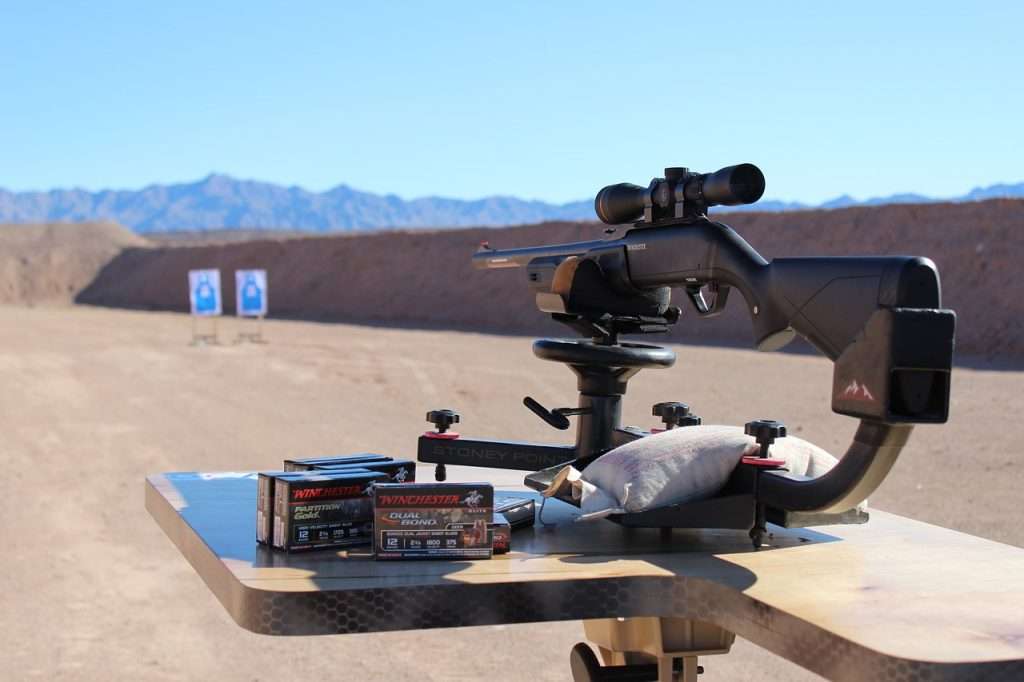 winchester and rifle on a shooting range outdoor