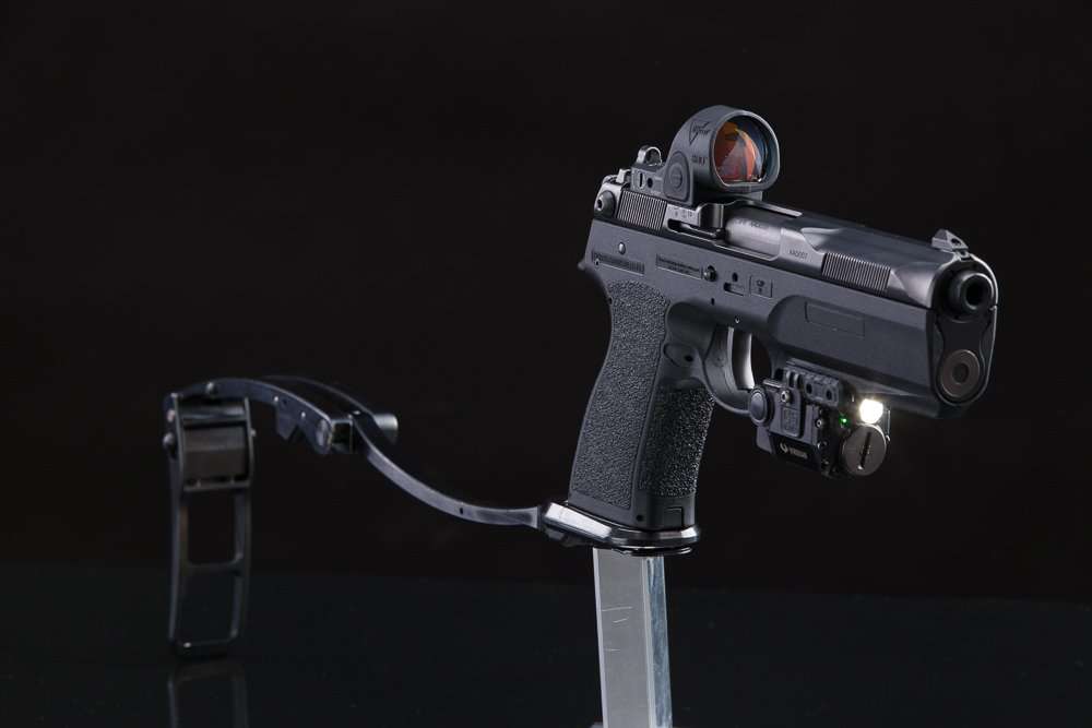 Pistol with a mounted red dot sight